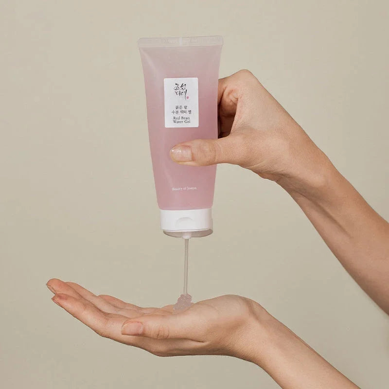 Red Bean Water Gel being dispensed into hand, Korean beauty skincare product