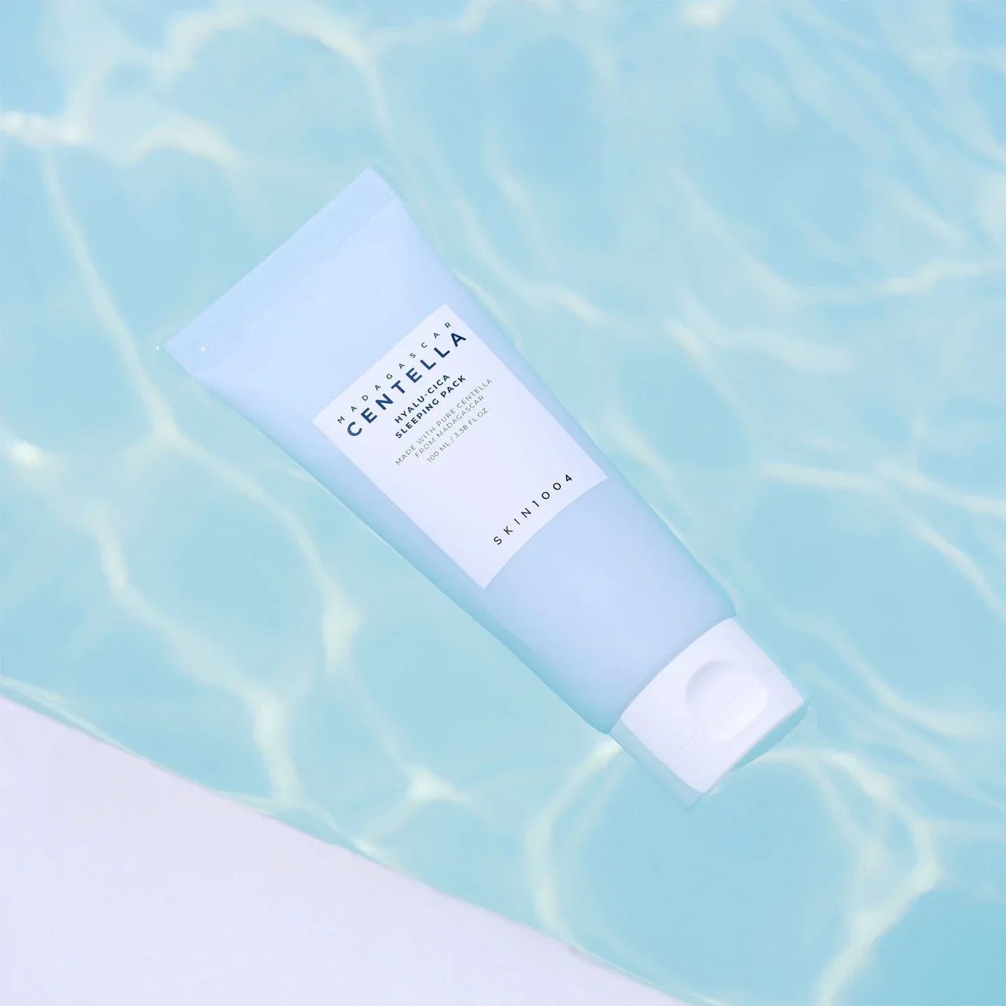 SKIN1004 Madagascar Centella Hyaluronic Sleeping Pack in clear pool water, gentle skincare for radiant skin